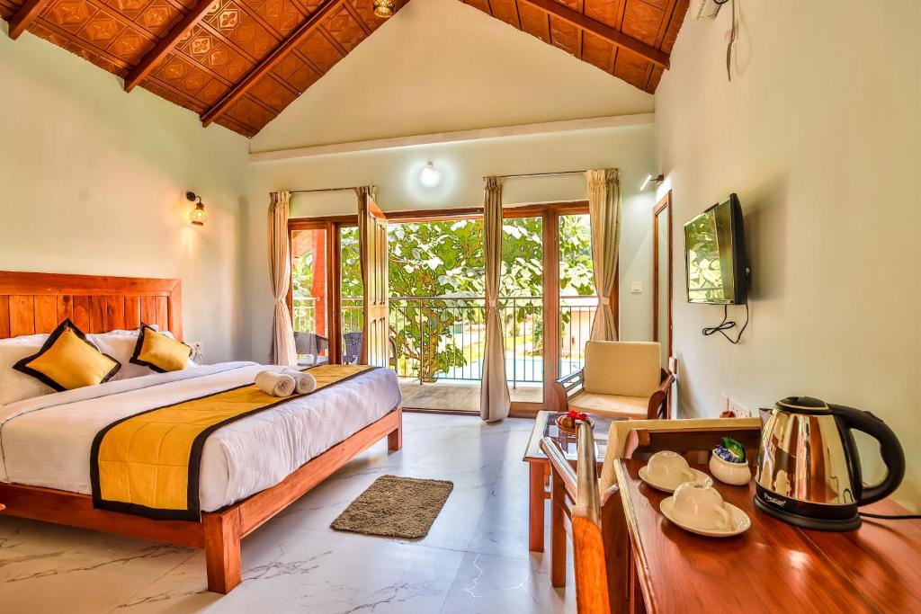 Postel nebo postele na pokoji v ubytování Hill Crest Resort - Coorg