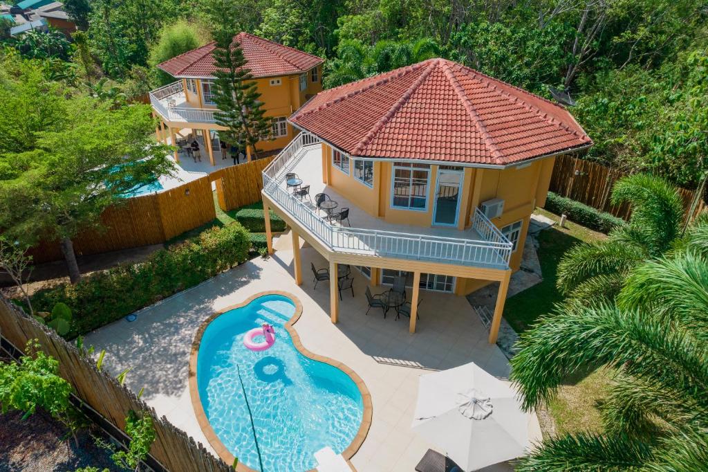an aerial view of a house with a swimming pool at Twin Villas Ao Nang in Ao Nang Beach