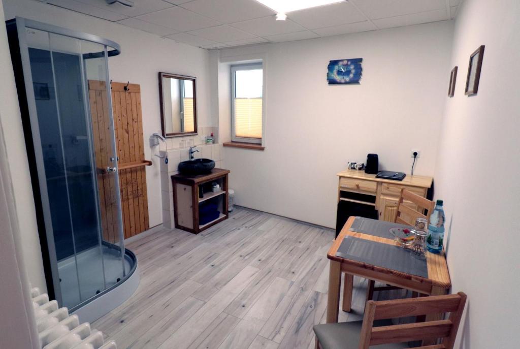 Kuchyň nebo kuchyňský kout v ubytování Gästezimmer zum rotem Karpfen
