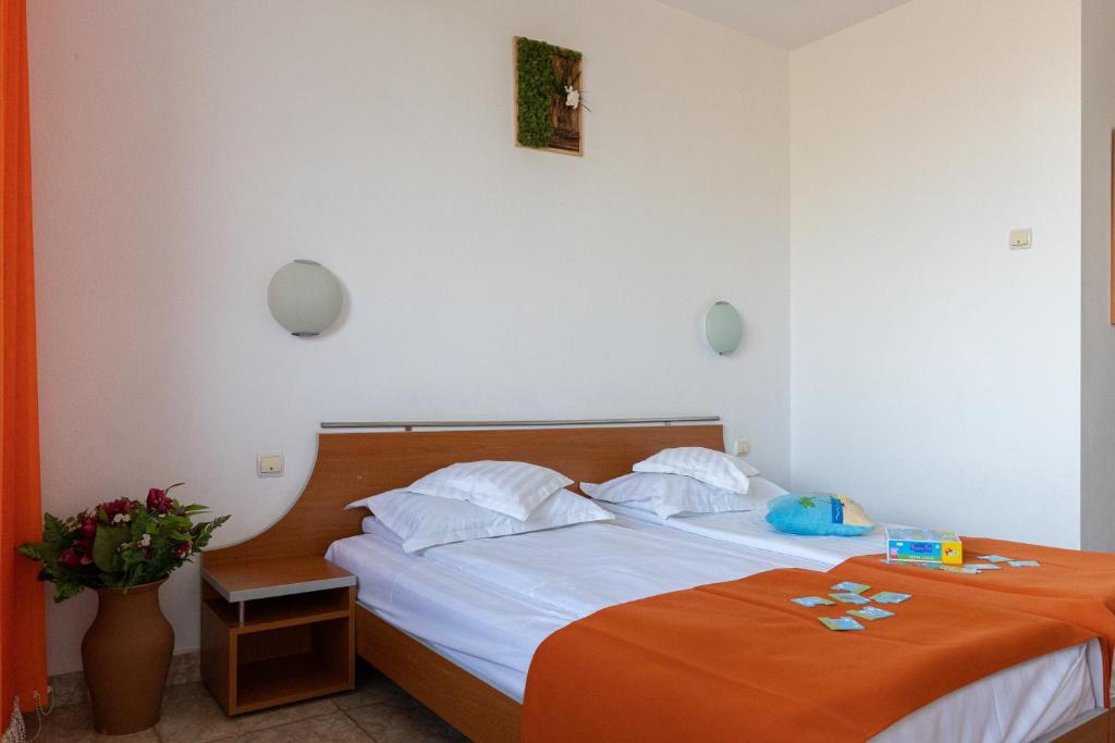 Voodi või voodid majutusasutuse HOTEL DUNĂREA toas