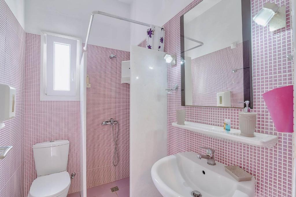 Un baño de Pavlos Place