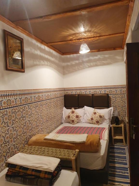 Postel nebo postele na pokoji v ubytování Riad 112
