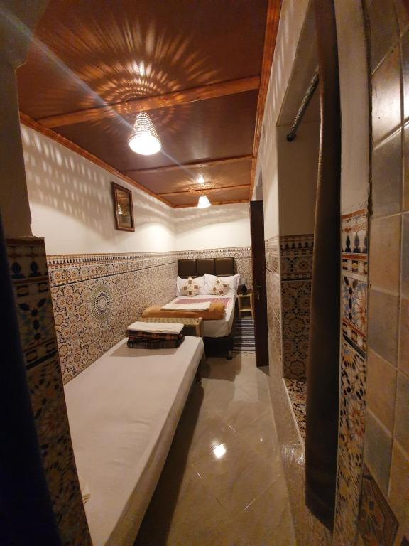 Postel nebo postele na pokoji v ubytování Riad 112