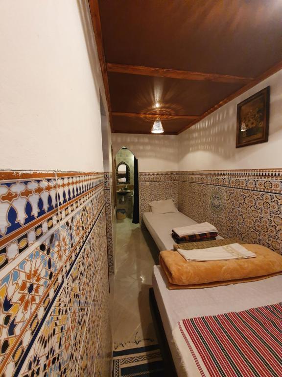 Postel nebo postele na pokoji v ubytování Riad 112