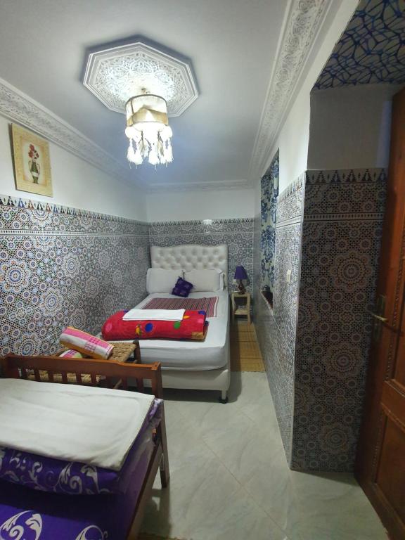 Postel nebo postele na pokoji v ubytování Riad 112
