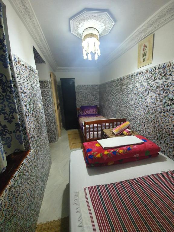 Postel nebo postele na pokoji v ubytování Riad 112