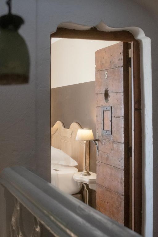 Postel nebo postele na pokoji v ubytování Hotel Les Messugues