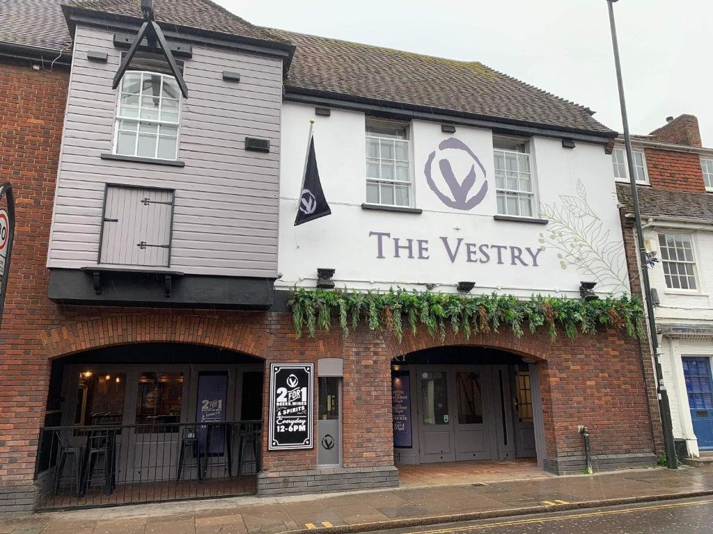 a building with a sign that reads the varsity at The Vestry in Chichester