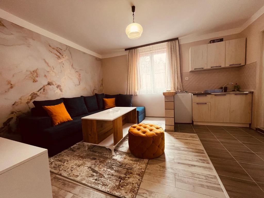 Kuchyň nebo kuchyňský kout v ubytování SNAM Rooms&Apartment