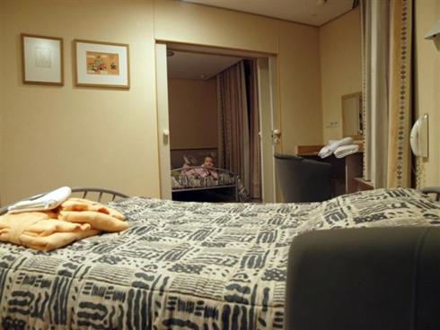 Postel nebo postele na pokoji v ubytování Familiehotel Soll Cress Koksijde