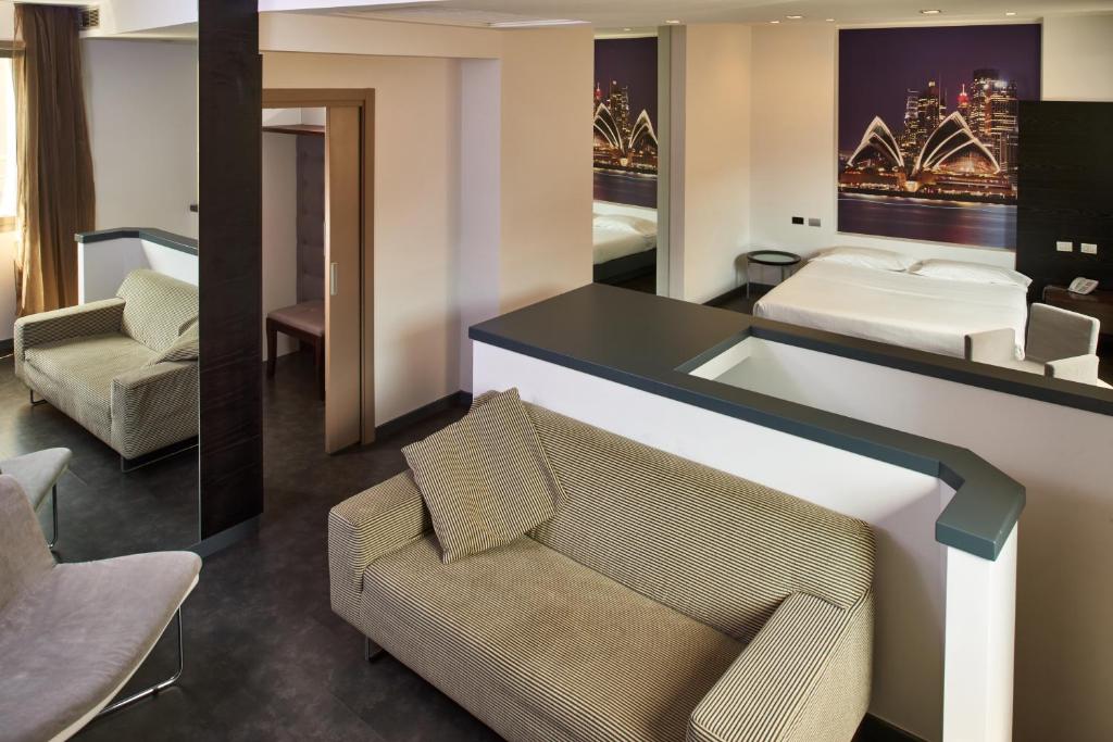Ένα ή περισσότερα κρεβάτια σε δωμάτιο στο Hotel Cruise