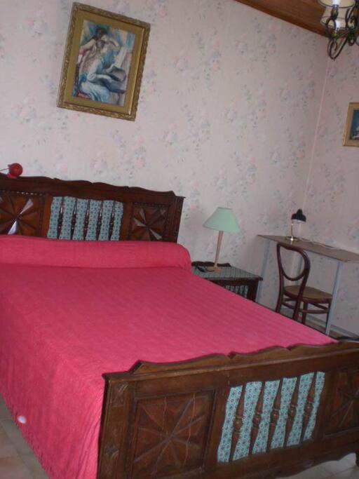 Postel nebo postele na pokoji v ubytování Gîte Saint Michel 2 étoiles