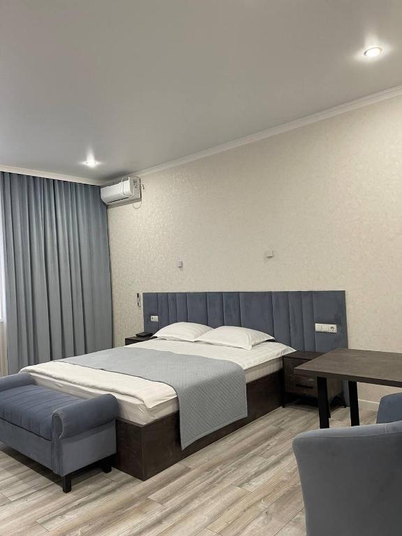 Postel nebo postele na pokoji v ubytování JETISY COMPLEX