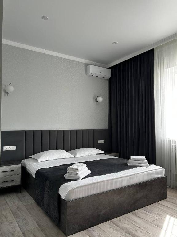 Postel nebo postele na pokoji v ubytování JETISY COMPLEX