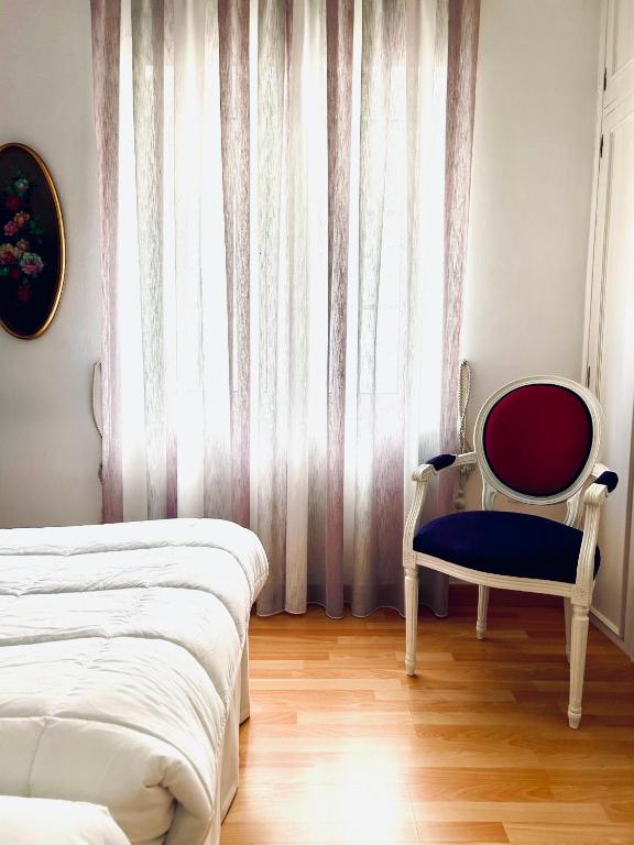Posteľ alebo postele v izbe v ubytovaní Casa de la Playa