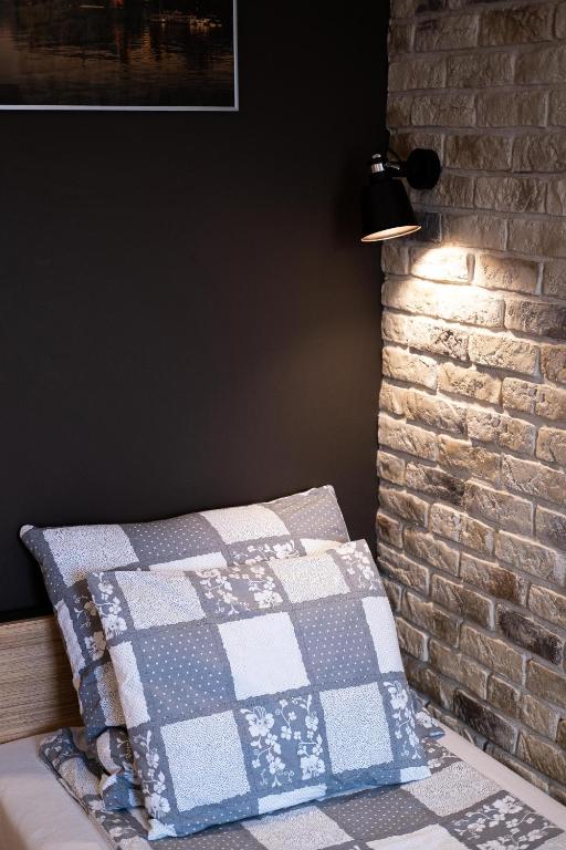 Posteľ alebo postele v izbe v ubytovaní Stawowa Premium Apartment - 69 m2 with sauna and private garage