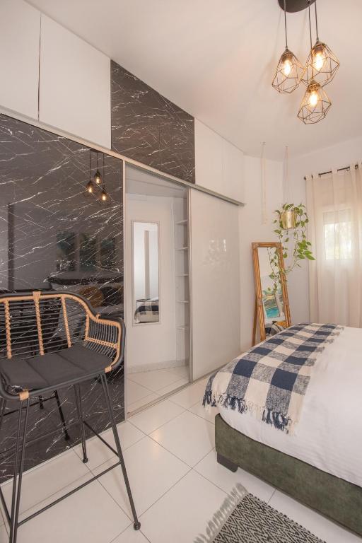 Postel nebo postele na pokoji v ubytování Inconceptual apartment