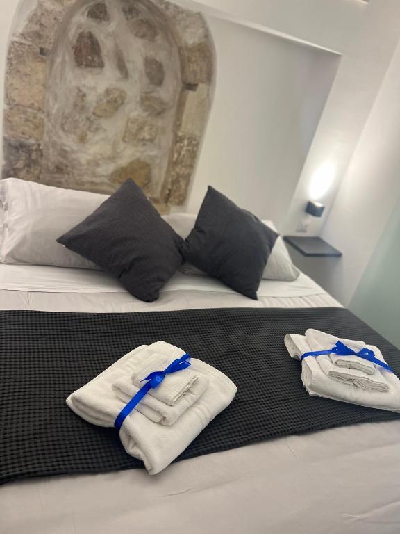 Posteľ alebo postele v izbe v ubytovaní Gargallo Suite Ortigia