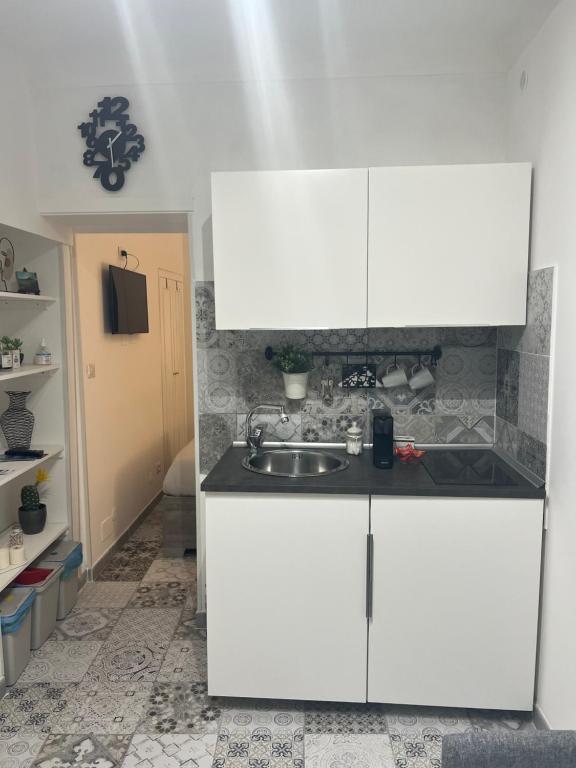 Kuchyňa alebo kuchynka v ubytovaní Gargallo Suite Ortigia