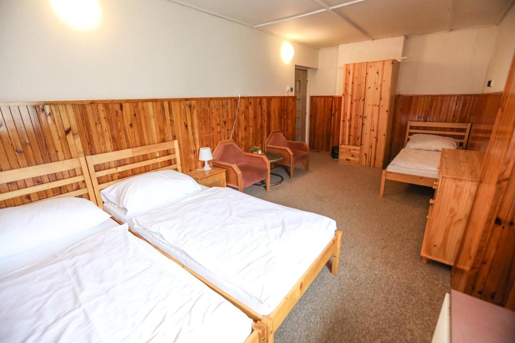 Postel nebo postele na pokoji v ubytování Horská chata Medika