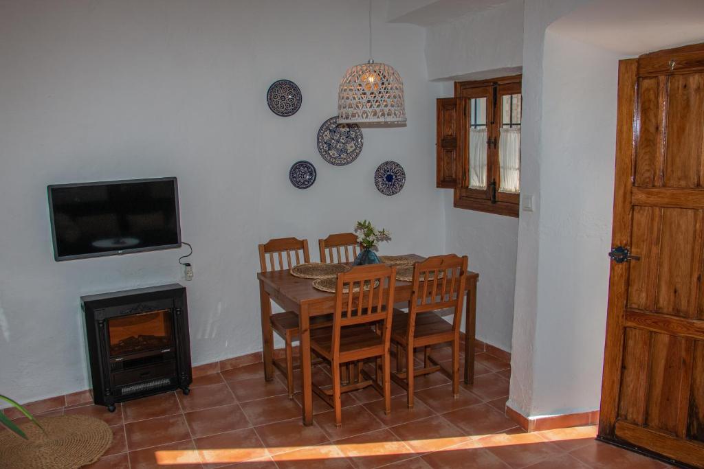 TV a/nebo společenská místnost v ubytování Acogedora Casa Rural en Olvera La Morada