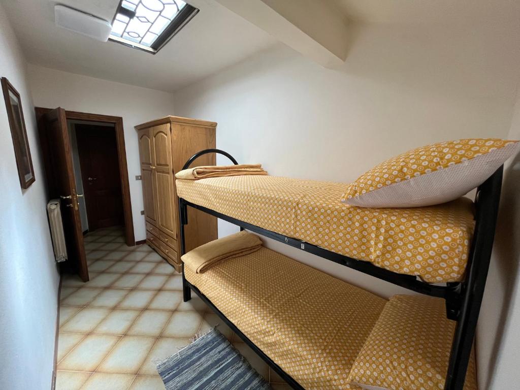 Postel nebo postele na pokoji v ubytování Casa di Ape Emma