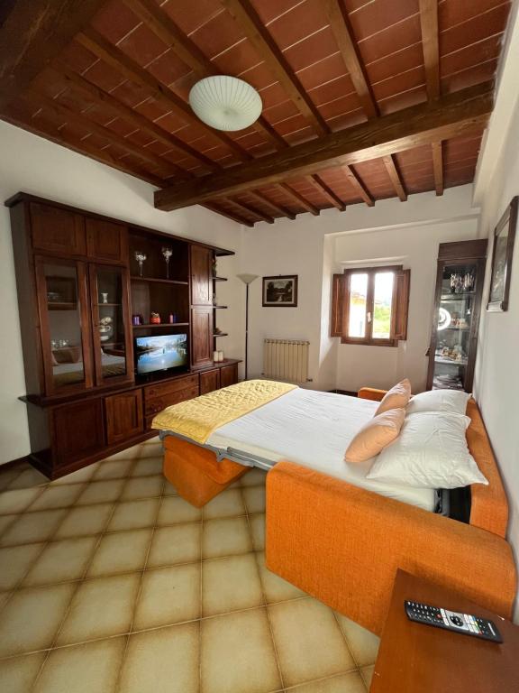 Postel nebo postele na pokoji v ubytování Casa di Ape Emma
