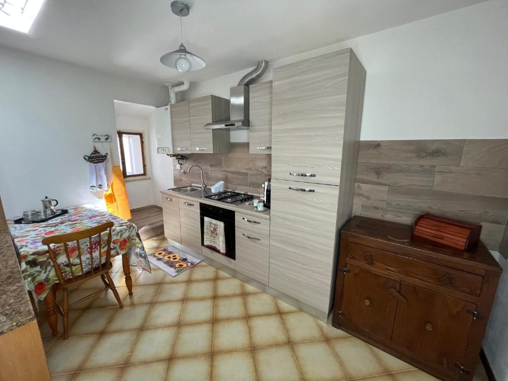 Kuchyň nebo kuchyňský kout v ubytování Casa di Ape Emma
