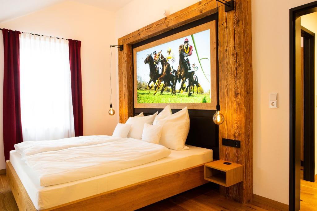 Postel nebo postele na pokoji v ubytování Gasthof & Hotel Bichler