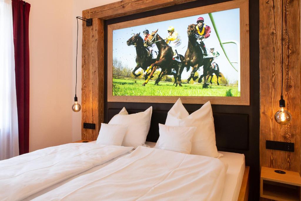 Postel nebo postele na pokoji v ubytování Gasthof & Hotel Bichler