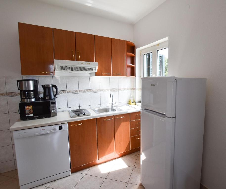 Fotografie z fotogalerie ubytování Apartments Karmen I v Primoštenu
