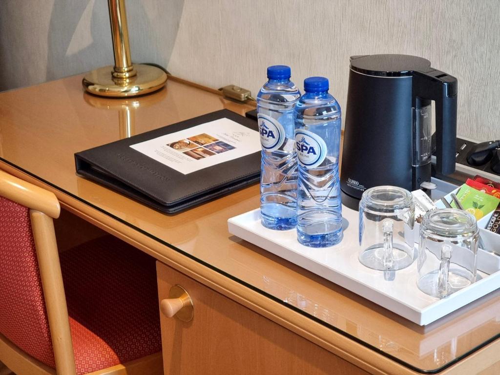 Nápoje v ubytování Hotel Cardinal