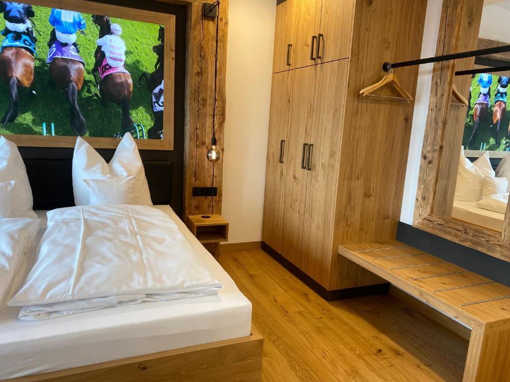 Postel nebo postele na pokoji v ubytování Gasthof & Hotel Bichler