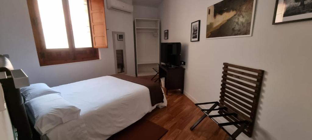 Postel nebo postele na pokoji v ubytování Atrium Toledo