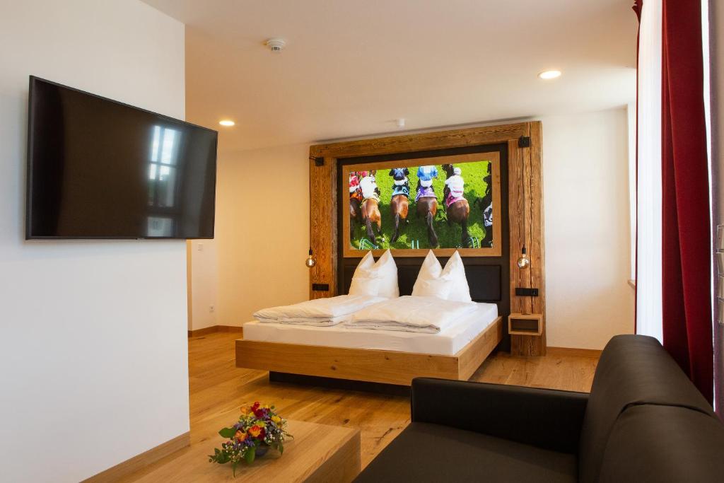 TV a/nebo společenská místnost v ubytování Gasthof & Hotel Bichler