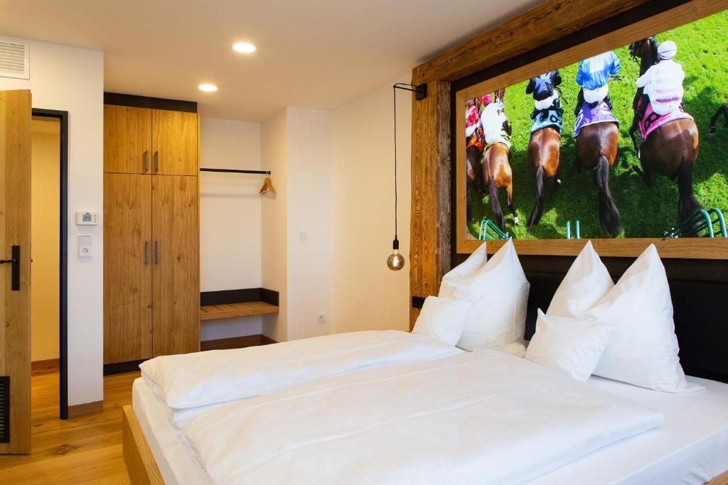 Postel nebo postele na pokoji v ubytování Gasthof & Hotel Bichler
