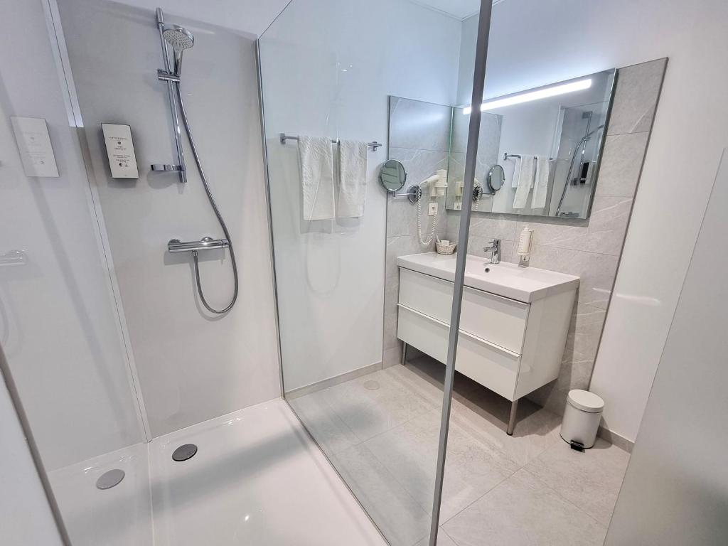 Koupelna v ubytování Hotel Cardinal