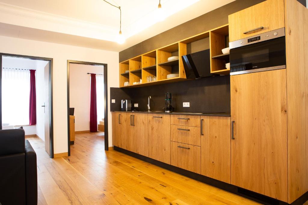 Kuchyň nebo kuchyňský kout v ubytování Gasthof & Hotel Bichler