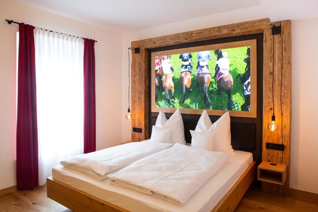 Postel nebo postele na pokoji v ubytování Gasthof & Hotel Bichler