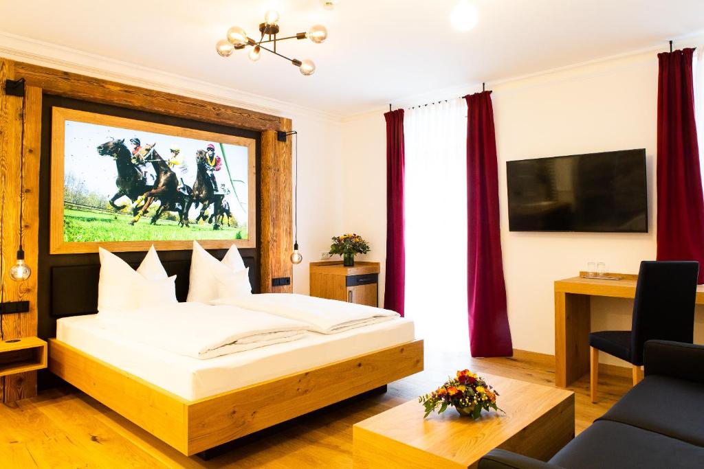TV a/nebo společenská místnost v ubytování Gasthof & Hotel Bichler