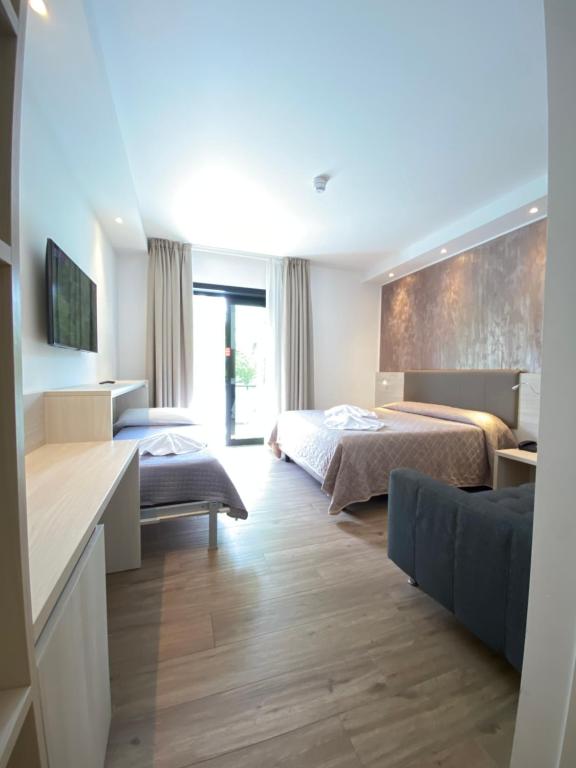 Postel nebo postele na pokoji v ubytování Hotel Aldebaran