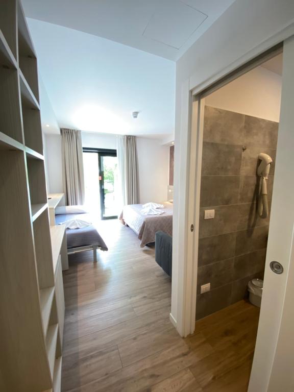 Postel nebo postele na pokoji v ubytování Hotel Aldebaran