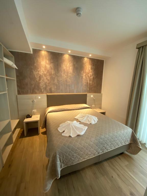 Postel nebo postele na pokoji v ubytování Hotel Aldebaran