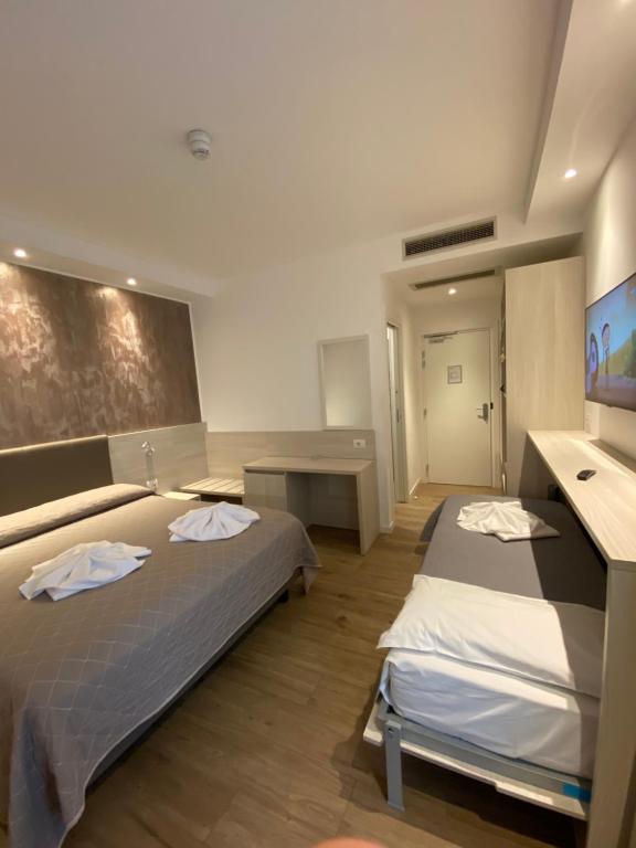 Postel nebo postele na pokoji v ubytování Hotel Aldebaran