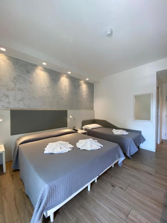 Postel nebo postele na pokoji v ubytování Hotel Aldebaran