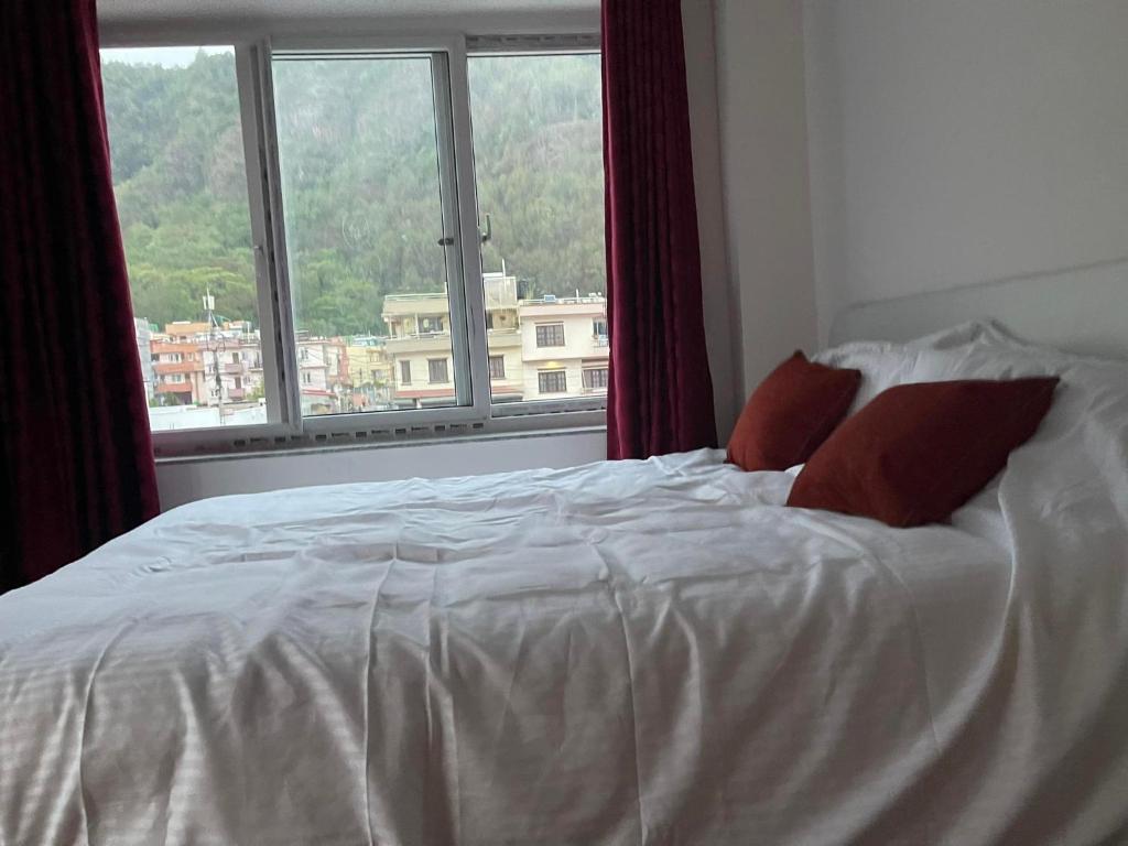 Postel nebo postele na pokoji v ubytování Mount Star Homestay
