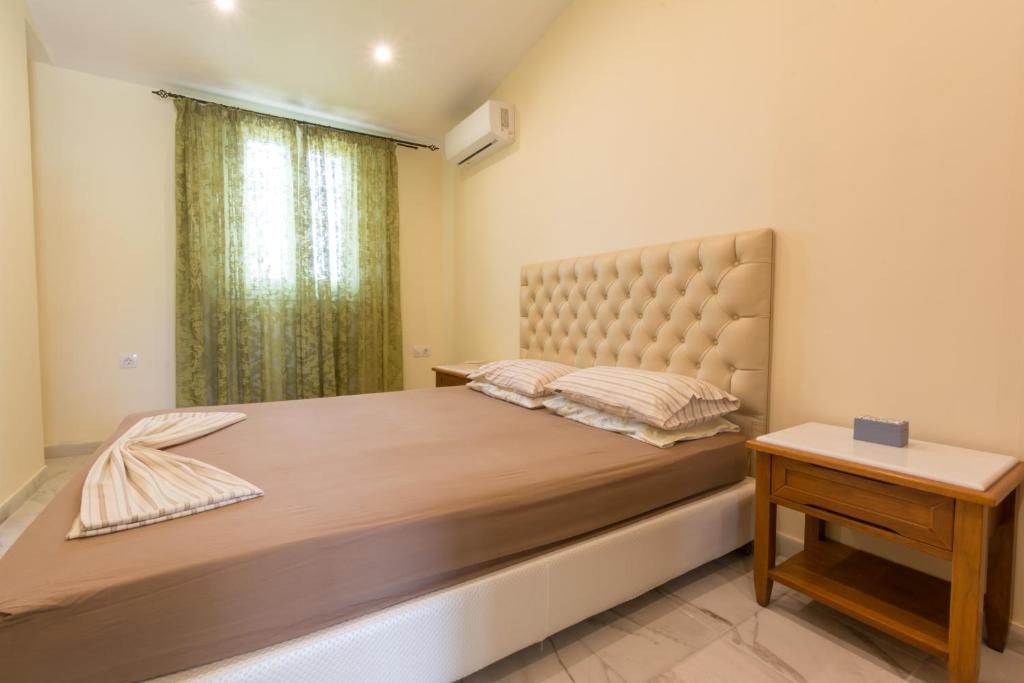 Posteľ alebo postele v izbe v ubytovaní Vasilikis Sea House