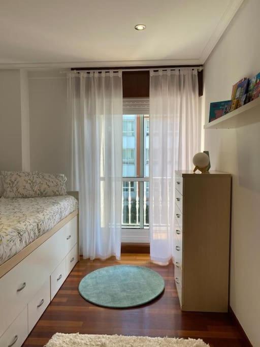 Posteľ alebo postele v izbe v ubytovaní Apartamento próximo a la playa