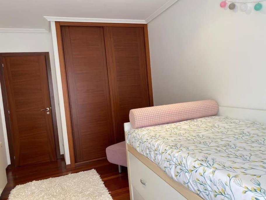 Posteľ alebo postele v izbe v ubytovaní Apartamento próximo a la playa