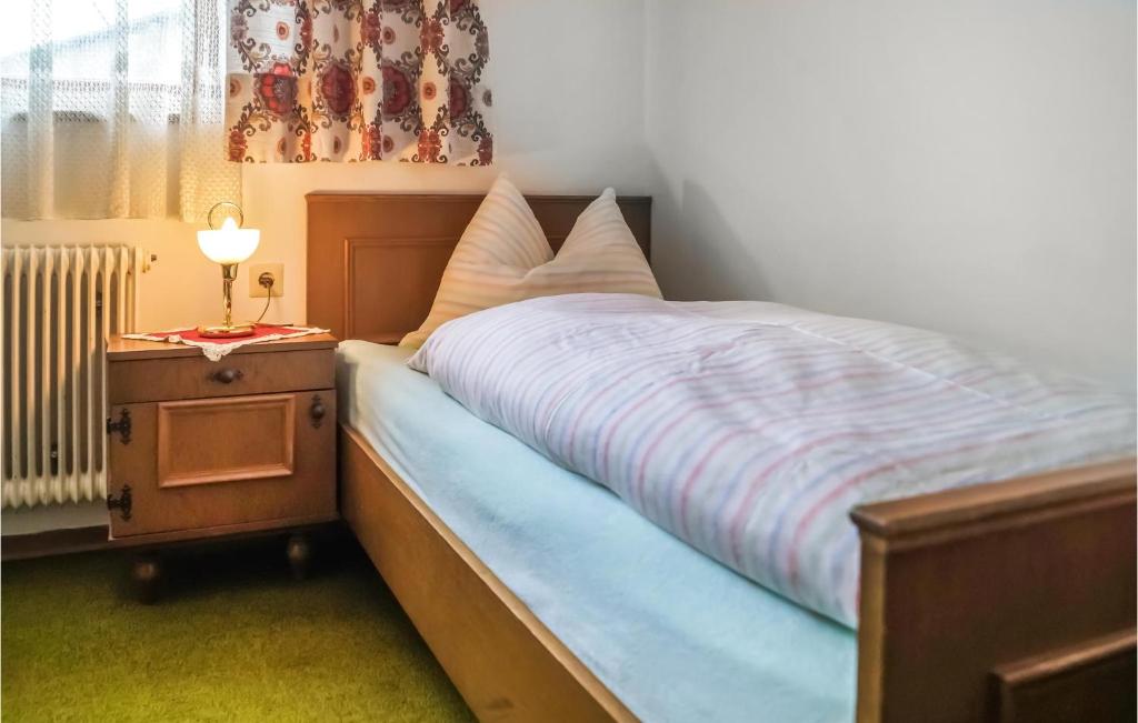 Postel nebo postele na pokoji v ubytování Gemuetliches Ferienhaus - Pill